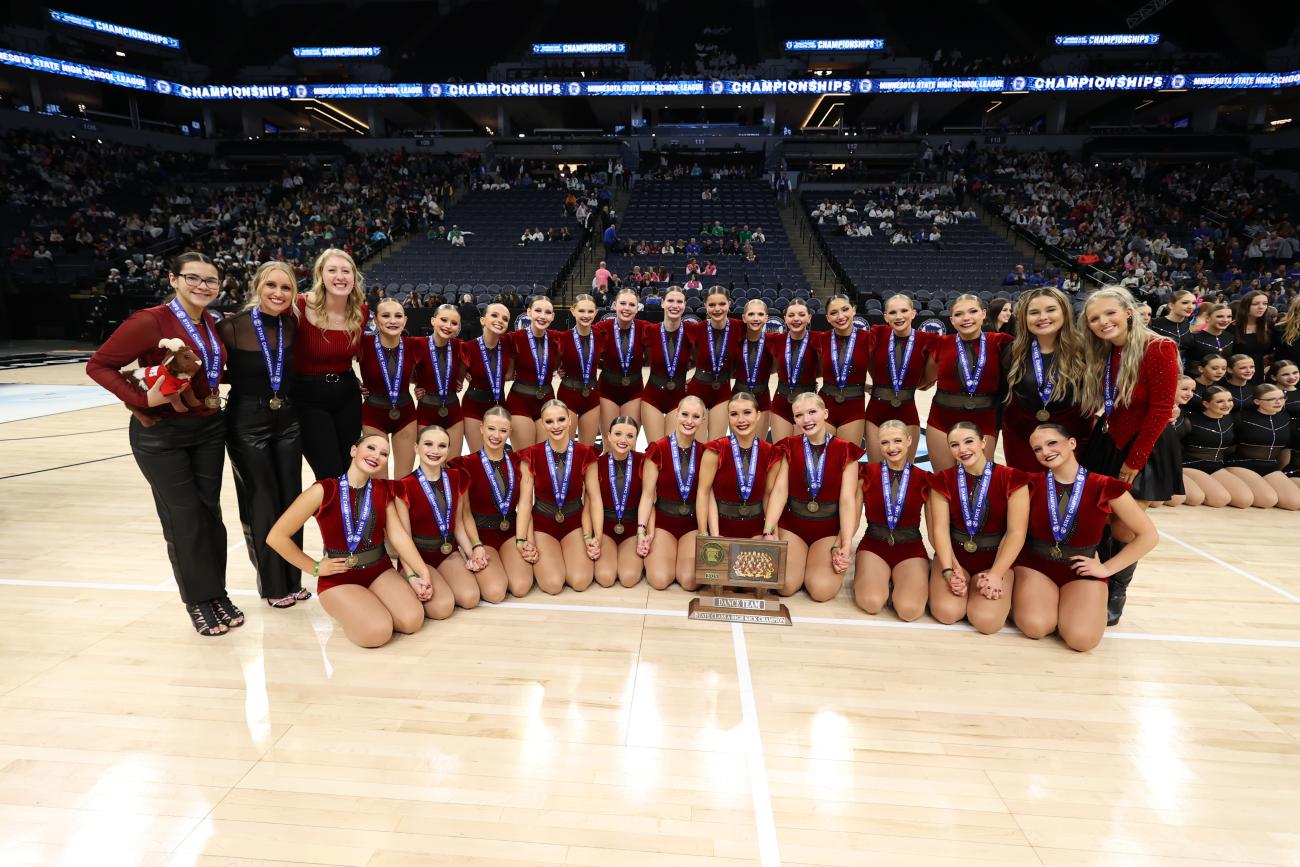 The Lac qui Parle Valley/Dawson-Boyd Dance Team poses with its 2025 High Kick State Championship trophy.