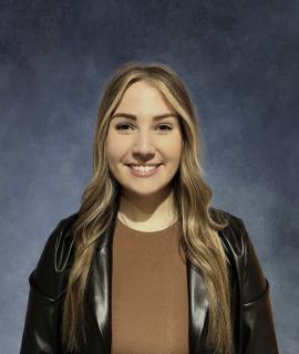 Headshot of administrative assistant Savannah Shea 